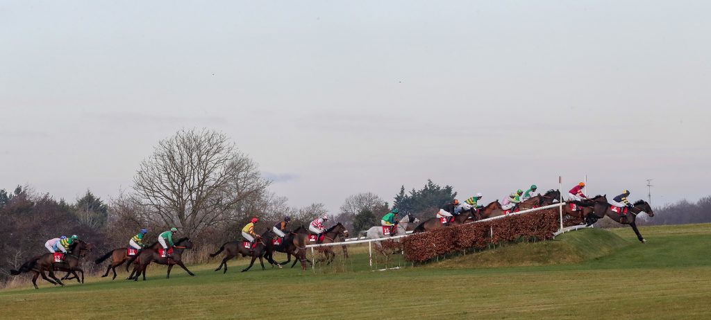 Ballyboker Bridge ridden by Barry Walsh leads the field during The EMS Copiers Risk Of Thunder Steeplechase won by Yanworth and Mark Walsh, white cap. Photo.carolinenorris.ie